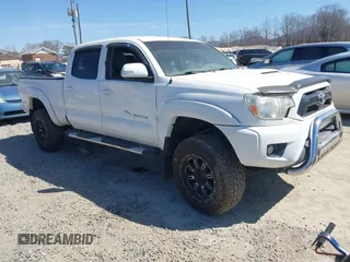 2013 Toyota Tacoma z VIN 5TFMU4FN7DX016614, wystawiony jako IAAI lot #41786188 z przebiegiem 139 833 mil mil oraz . Historia ofert i sprzedaży dostępna na DreamBid. Obrazek 1.