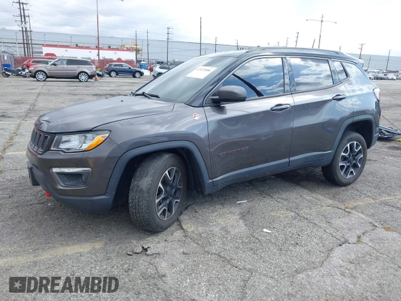 2021 Jeep Compass Trailhawk with VIN 3C4NJDDB6MT561074, listed as a IAAI auction lot 42125886 with 77,293 mi miles and . Bid and sale history available at DreamBid. Image 23.