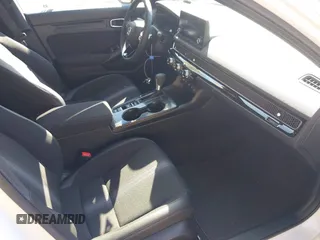 2025 Honda Civic Sport z VIN 2HGFE2F59SH516089, wystawiony jako IAAI lot #41772188 z przebiegiem 975 mil mil oraz . Historia ofert i sprzedaży dostępna na DreamBid. Obrazek 5.
