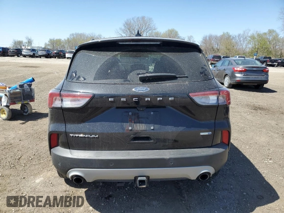 2020 Ford Escape Titanium with VIN 1FMCU9J97LUA55895, listed as a Copart auction lot 53058785 with 70,988 mi miles and Salvage title. Bid and sale history available at DreamBid. Image 6.