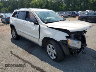 2011 Jeep Grand Cherokee Laredo with VIN 1J4RR4GG6BC657520, listed as a Copart auction lot 63558355 with 215,444 mi miles and Salvage title. Bid and sale history available at DreamBid. Image 4.