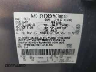 2011 Ford Explorer XLT with VIN 1FMHK8D88BGA34236, listed as a Copart auction lot 61095005 with 148,984 mi miles and Salvage title. Bid and sale history available at DreamBid. Image 14.