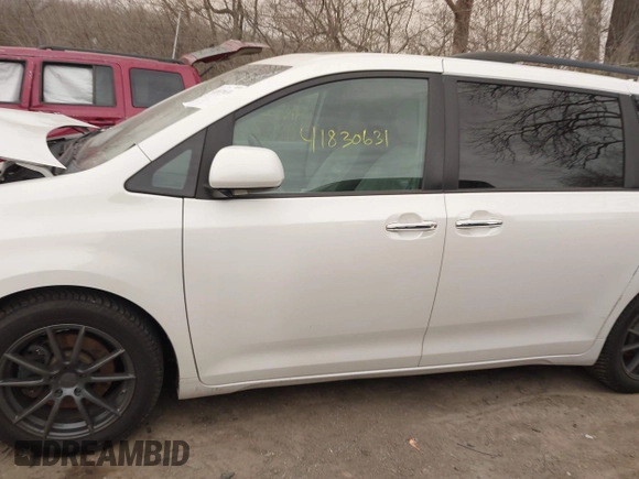 2011 Toyota Sienna XLE AAS with VIN 5TDYK3DC8BS003313, listed as a IAAI auction lot 41830631 with 214,514 mi miles and . Bid and sale history available at DreamBid. Image 14.