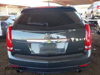 2014 Cadillac SRX Premium Collection z VIN 3GYFNDE31ES653114, wystawiony jako IAAI lot #42107858 z przebiegiem 125 192 mil mil oraz . Historia ofert i sprzedaży dostępna na DreamBid. Obrazek 16.