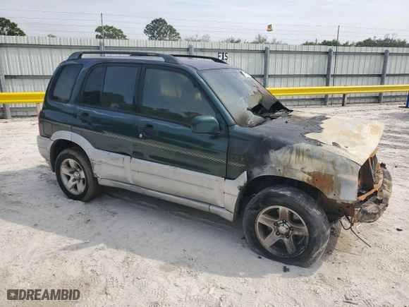 2000 Suzuki Grand Vitara JLX with VIN JS3TD62V5Y4113946, listed as a Copart auction lot 49154945 with 0 mi miles and Non Repairable. Bid and sale history available at carsss.com. Image 4.