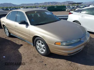2001 Oldsmobile Intrigue GX z VIN 1G3WH52H31F216815, wystawiony jako IAAI lot #42054667 z przebiegiem 134 779 mil mil oraz . Historia ofert i sprzedaży dostępna na DreamBid. Obrazek 1.