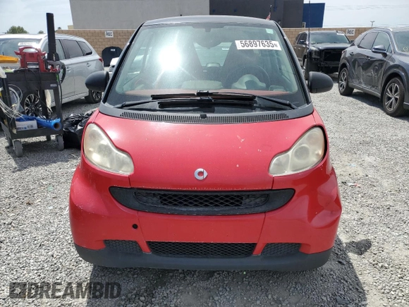 2009 Smart fortwo Pure z VIN WMEEJ31X89K291074, wystawiony jako Copart lot #56897635 z przebiegiem 145 504 mil mil oraz Czysty tytuł • Clean title. Historia ofert i sprzedaży dostępna na DreamBid. Obrazek 5.