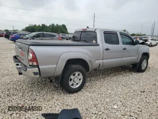 2014 Toyota Tacoma with VIN 3TMMU4FN0EM072840, listed as a Copart auction lot 51740805 with 128,678 mi miles and Salvage title. Bid and sale history available at DreamBid. Image 3.