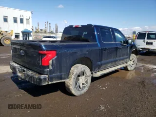 2023 Ford F-150 Lightning Pro with VIN 1FT6W1EV4PWG24488, listed as a Copart auction lot 51523945 with Not provided miles and Salvage title. Bid and sale history available at DreamBid. Image 3.