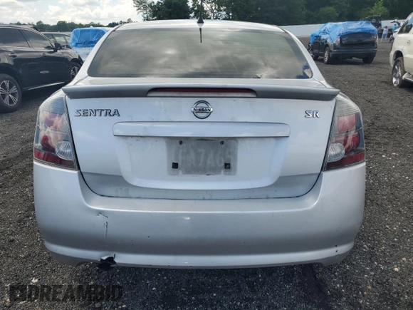 2011 Nissan Sentra SR z VIN 3N1AB6AP1BL658450, wystawiony jako Copart lot #60906635 z przebiegiem Nie podano mil oraz Szkoda całkowita • Salvage title. Historia ofert i sprzedaży dostępna na DreamBid. Obrazek 6.