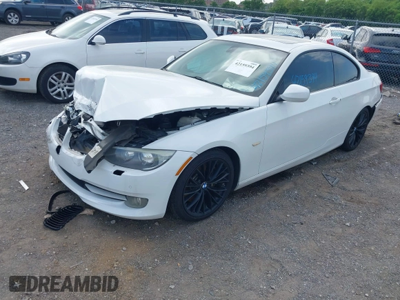 2011 BMW 3 Series 335i with VIN WBAKG7C56BE598702, listed as a IAAI auction lot 42159394 with Not provided miles and . Bid and sale history available at DreamBid. Image 2.