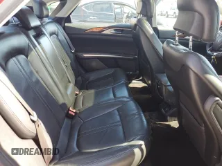 2013 Lincoln MKZ z VIN 3LN6L2GK3DR817386, wystawiony jako Copart lot #55602535 z przebiegiem 121 664 mil mil oraz Szkoda całkowita • Salvage title. Historia ofert i sprzedaży dostępna na DreamBid. Obrazek 10.