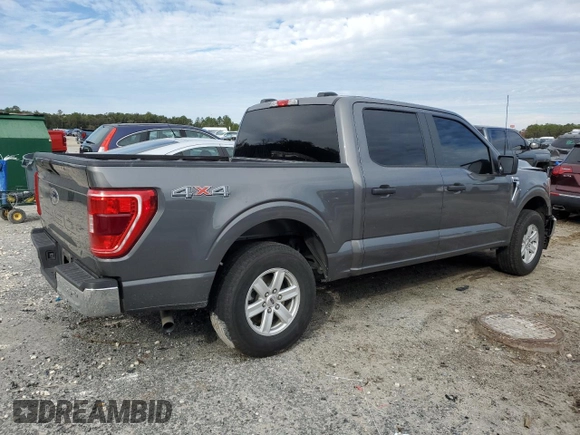 2023 Ford F-150 XL with VIN 1FTEW1EB0PKE65574, listed as a Copart auction lot 88522215 with 80,828 mi miles and Salvage Title. Bid and sale history available at carsss.com. Image 3.