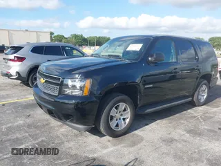 2013 Chevrolet Tahoe Commercial z VIN 1GNLC2E05DR218100, wystawiony jako IAAI lot #42182072 z przebiegiem 162 888 mil mil oraz . Historia ofert i sprzedaży dostępna na DreamBid. Obrazek 18.