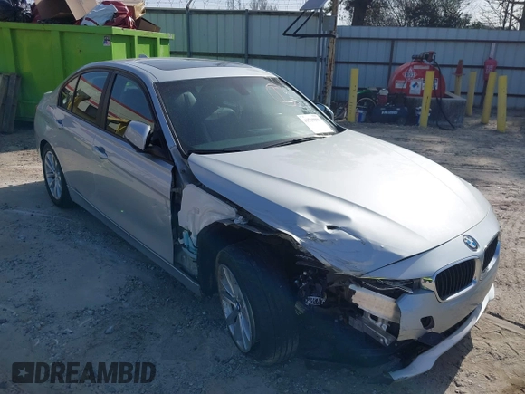 2018 BMW 3 Series 320i with VIN WBA8A9C55JAH14990, listed as a IAAI auction lot 41719896 with 77,472 mi miles. Bid and sale history available at carsss.com. Image 1.