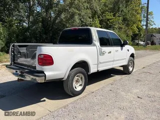 2001 Ford F-150 SuperCrew XLT with VIN 1FTRW08L91KC28928, listed as a Copart auction lot 74771894 with 230,473 mi miles and Clean Title. Bid and sale history available at carsss.com. Image 4.