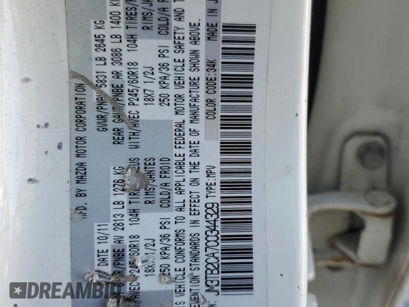 2012 Mazda CX-9 Touring z VIN JM3TB2CA7C0344329, wystawiony jako Copart lot #51869975 z przebiegiem 216 114 mil mil oraz Szkoda całkowita • Salvage title. Historia ofert i sprzedaży dostępna na DreamBid. Obrazek 13.