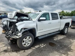 2018 GMC Sierra 2500HD SLT with VIN 1GT12TEG4JF202330, listed as a Copart auction lot 62895355 with 87,049 mi miles and Salvage title. Bid and sale history available at DreamBid. Image 1.