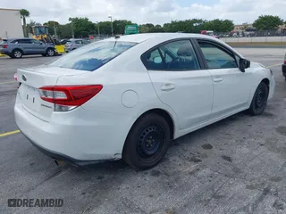 2018 Subaru Impreza with VIN 4S3GKAA68J3609404, listed as a IAAI auction lot 41954733 with 214,560 mi miles. Bid and sale history available at carsss.com. Image 4.
