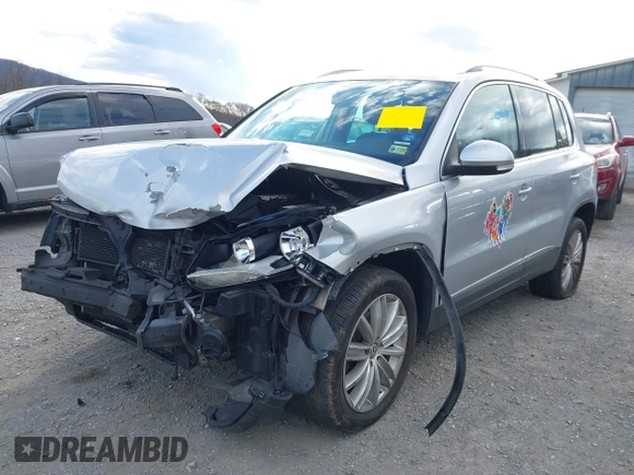 2012 Volkswagen Tiguan SE with VIN WVGAV7AX2CW543003, listed as a IAAI auction lot 41803970 with 187,639 mi miles and . Bid and sale history available at DreamBid. Image 6.