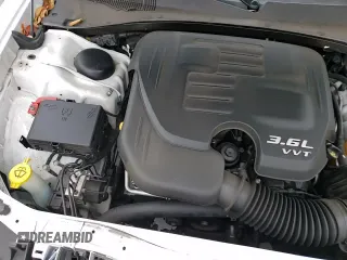 2013 Dodge Charger SE z VIN 2C3CDXBG0DH717945, wystawiony jako Copart lot #85541364 z przebiegiem 139 229 mil mil oraz Szkoda całkowita • Salvage title. Historia ofert i sprzedaży dostępna na DreamBid. Obrazek 13.