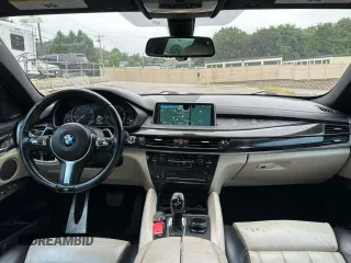 2015 BMW X6 xDrive50i with VIN 5UXKU6C59F0F93634, listed as a Copart auction lot 68158794 with 109,923 mi miles and Clean Title. Bid and sale history available at carsss.com. Image 7.