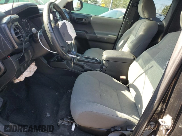 2017 Toyota Tacoma SR z VIN 5TFSX5ENXHX057041, wystawiony jako Copart lot #56187245 z przebiegiem 97 281 mil mil oraz Szkoda całkowita • Salvage title. Historia ofert i sprzedaży dostępna na DreamBid. Obrazek 7.