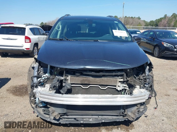 2020 Chrysler Pacifica Touring L z VIN 2C4RC1BG4LR230598, wystawiony jako IAAI lot #41782052 z przebiegiem 184 093 mil mil oraz . Historia ofert i sprzedaży dostępna na DreamBid. Obrazek 12.