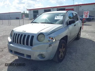 2007 Jeep Compass Sport with VIN 1J8FT47W57D185807, listed as a IAAI auction lot 41700283 with 194,339 mi miles. Bid and sale history available at carsss.com. Image 6.