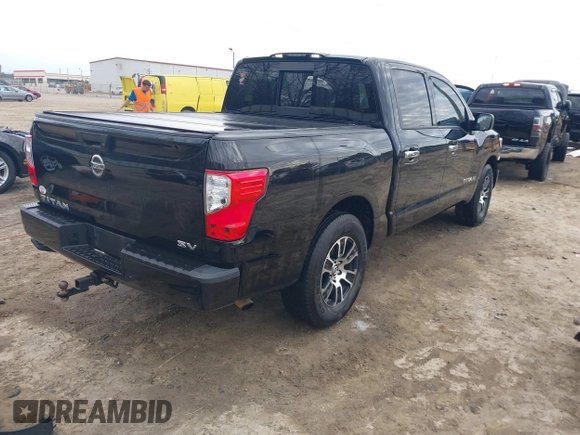 2021 Nissan Titan SV z VIN 1N6AA1EF9MN523477, wystawiony jako IAAI lot #41536972 z przebiegiem 47 917 mil mil oraz . Historia ofert i sprzedaży dostępna na DreamBid. Obrazek 4.