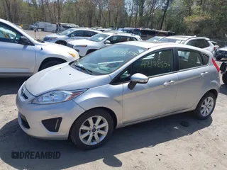 2013 Ford Fiesta SE with VIN 3FADP4EJ3DM136332, listed as a IAAI auction lot 42142556 with 69,979 mi miles and . Bid and sale history available at DreamBid. Image 6.