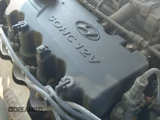 2002 Hyundai Accent z VIN KMHCF35G52U207543, wystawiony jako IAAI lot #42556293 z przebiegiem 176 395 mil mil oraz . Historia ofert i sprzedaży dostępna na DreamBid. Obrazek 12.