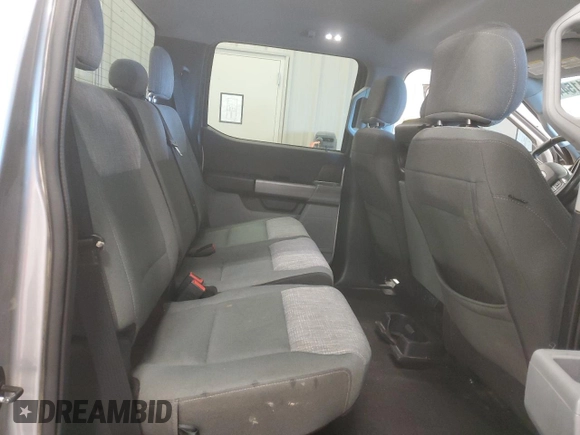 2021 Ford F-150 XL with VIN 1FTFW1E55MFA72141, listed as a Copart auction lot 83111544 with 67,380 mi miles and Salvage Title. Bid and sale history available at carsss.com. Image 12.