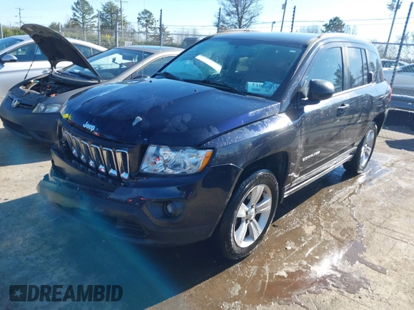 2011 Jeep Compass with VIN 1J4NF1FB6BD180447, listed as a IAAI auction lot 41575014 with 130,694 mi miles. Bid and sale history available at carsss.com. Image 17.
