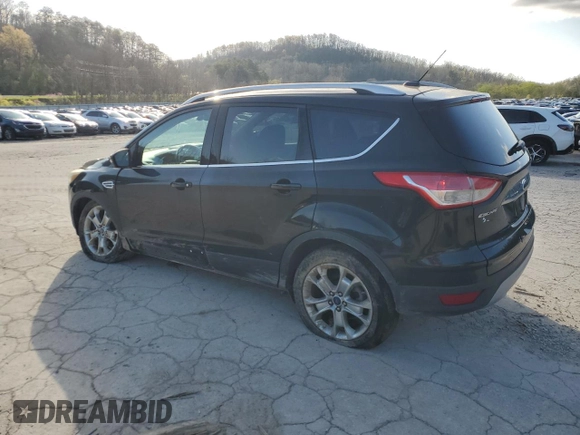 2014 Ford Escape Titanium with VIN 1FMCU9J94EUE57909, listed as a Copart auction lot 51955785 with 154,819 mi miles and Salvage Title. Bid and sale history available at DreamBid. Image 2.