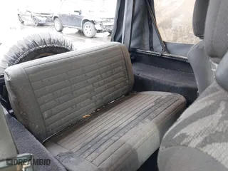 1995 Jeep Wrangler S with VIN 1J4FY19P0SP258399, listed as a IAAI auction lot 41970320 with 151,621 mi miles. Bid and sale history available at carsss.com. Image 8.