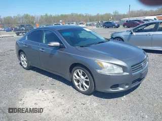 2014 Nissan Maxima SV with VIN 1N4AA5AP1EC458409, listed as a IAAI auction lot 42056758 with 103,570 mi miles and . Bid and sale history available at DreamBid. Image 1.
