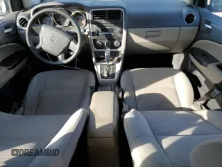 2010 Dodge Caliber Mainstreet z VIN 1B3CB3HA8AD638921, wystawiony jako Copart lot #49871265 z przebiegiem 152 109 mil mil oraz Szkody całkowita. Historia ofert i sprzedaży dostępna na DreamBid. Obrazek 8.