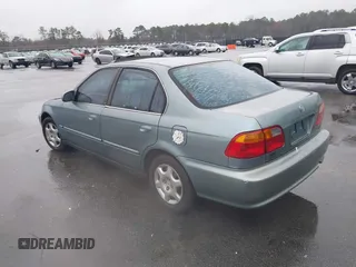 1999 Honda Civic EX z VIN 1HGEJ8643XL010821, wystawiony jako IAAI lot #41602036 z przebiegiem 165 139 mil mil oraz . Historia ofert i sprzedaży dostępna na DreamBid. Obrazek 3.