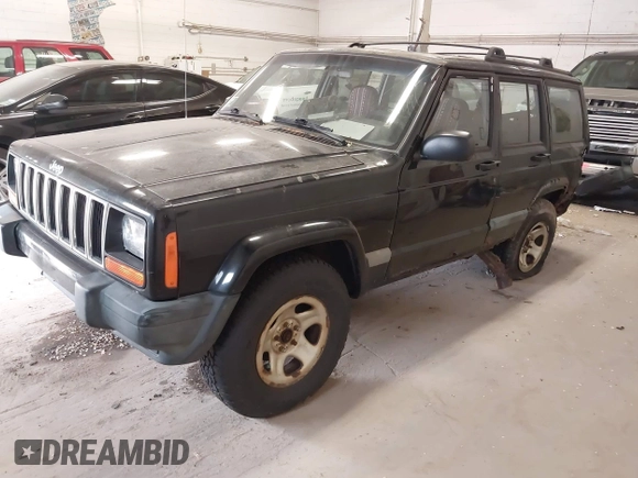 1999 Jeep Cherokee Sport z VIN 1J4FF68S4XL668081, wystawiony jako IAAI lot #42304649 z przebiegiem 194 470 mil mil oraz . Historia ofert i sprzedaży dostępna na DreamBid. Obrazek 2.