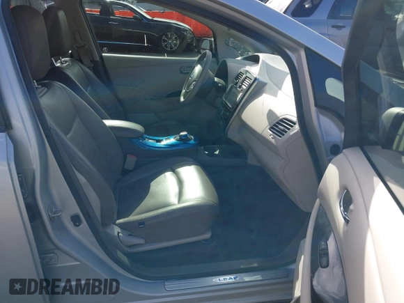 2011 Nissan LEAF SL-e z VIN JN1AZ0CP2BT008771, wystawiony jako IAAI lot #39745384 z przebiegiem 64 758 mil mil oraz . Historia ofert i sprzedaży dostępna na DreamBid. Obrazek 5.