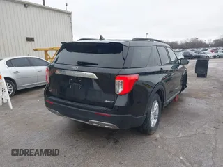 2023 Ford Explorer XLT with VIN 1FMSK8DH4PGB28045, listed as a IAAI auction lot 41723221 with 32,191 mi miles. Bid and sale history available at carsss.com. Image 4.