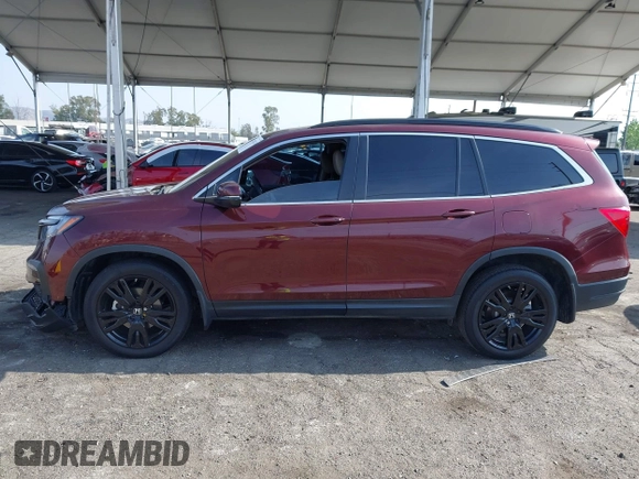 2022 Honda Pilot Special Edition z VIN 5FNYF6H21NB101647, wystawiony jako IAAI lot #42101234 z przebiegiem 32 862 mil mil oraz . Historia ofert i sprzedaży dostępna na DreamBid. Obrazek 14.