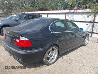 2001 BMW 3 Series 330i with VIN WBAAV53421FJ64069, listed as a IAAI auction lot 41760517 with Not Provided miles and . Bid and sale history available at carsss.com. Image 4.