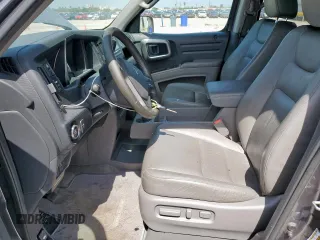 2014 Honda Ridgeline RTL z VIN 5FPYK1F53EB004694, wystawiony jako Copart lot #57222085 z przebiegiem 128 210 mil mil oraz Szkoda całkowita • Salvage title. Historia ofert i sprzedaży dostępna na DreamBid. Obrazek 7.