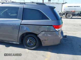 2014 Honda Odyssey EX-L with VIN 5FNRL5H66EB099792, listed as a IAAI auction lot 42160220 with 160,852 mi miles and . Bid and sale history available at carsss.com. Image 6.