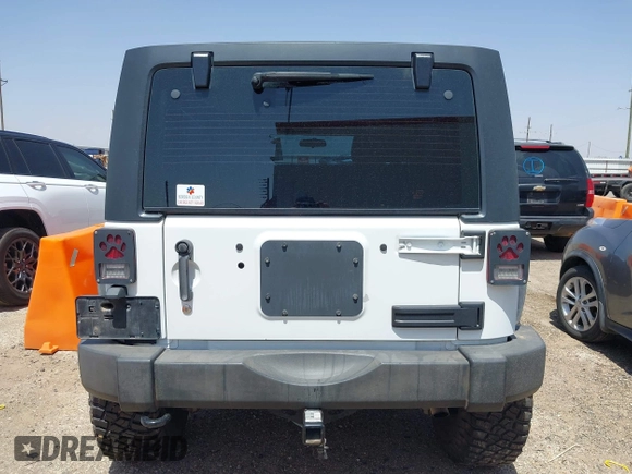 2013 Jeep Wrangler Unlimited Sport with VIN 1C4BJWDGXDL694054, listed as a IAAI auction lot 42097708 with 130,360 mi miles and . Bid and sale history available at DreamBid. Image 17.