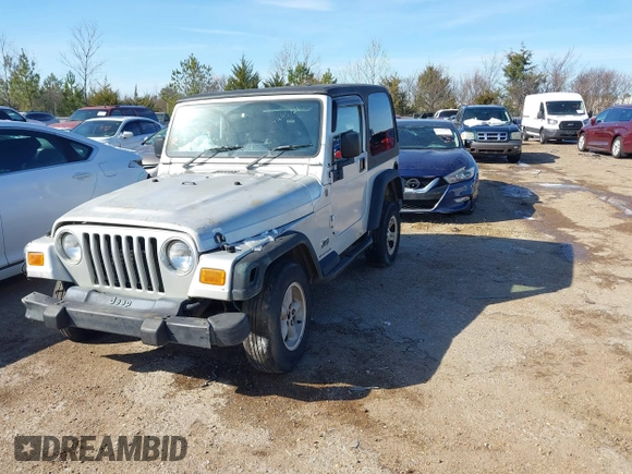 2004 Jeep Wrangler Sport Right Hand Drive with VIN 1J4F449SX4P780560, listed as a IAAI auction lot 41645721 with 146,681 mi miles. Bid and sale history available at carsss.com. Image 17.