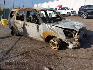 2002 Honda CR-V LX with VIN JHLRD68472C023334, listed as a IAAI auction lot 42096626 with Not Provided miles and . Bid and sale history available at carsss.com. Image 1.