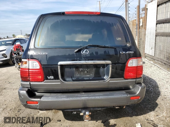 2001 Lexus LX 470 with VIN JTJHT00W613504449, listed as a Copart auction lot 45995455 with 229,056 mi miles and Salvage Title. Bid and sale history available at DreamBid. Image 6.